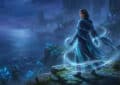 A woman in flowing blue robes with shimmering aqua elemental energy stands on a cliff overlooking a mystical glowing blue sea.